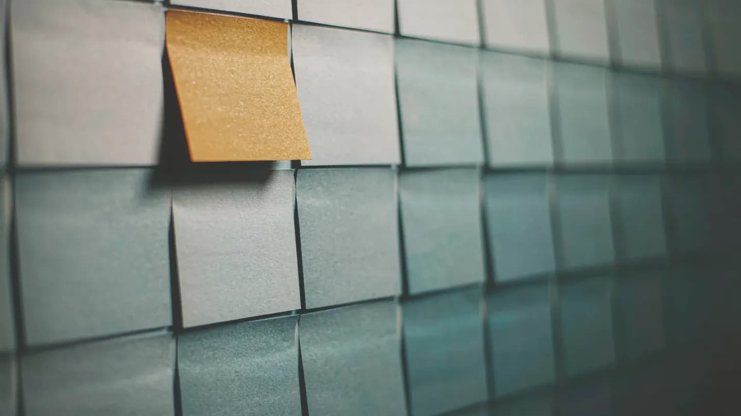 A feeling-first creative brief architecture laid out on a wall