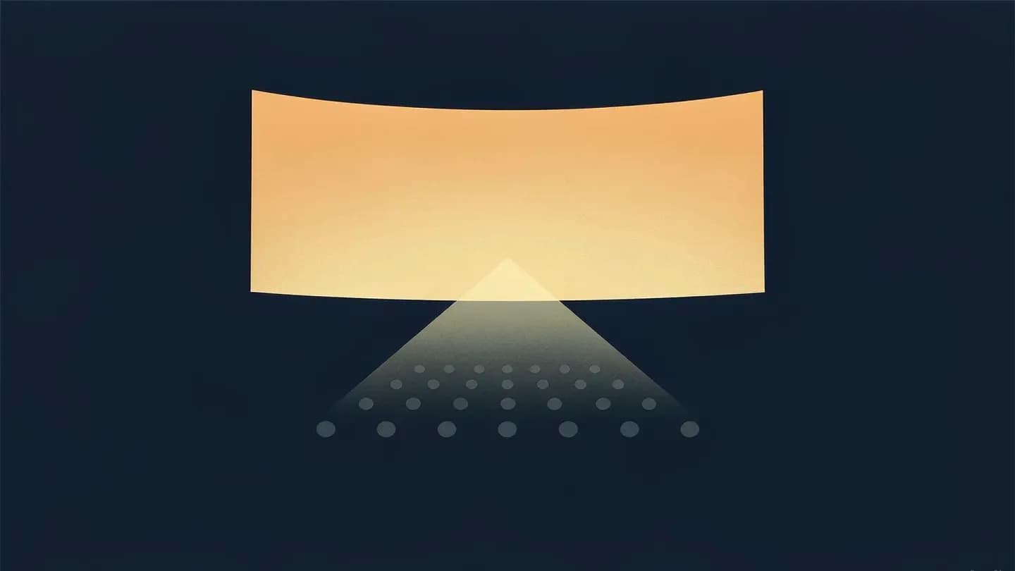 A glowing amber cinema screen lighting rows of grey dots in a dark navy auditorium.