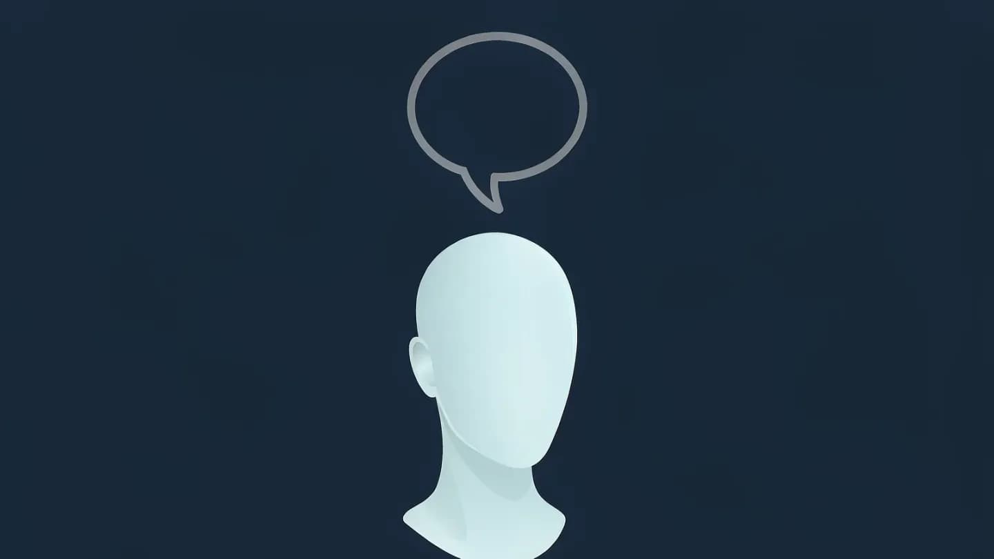 A smooth featureless pale-blue head with a large empty speech-bubble outline above it on a dark navy field