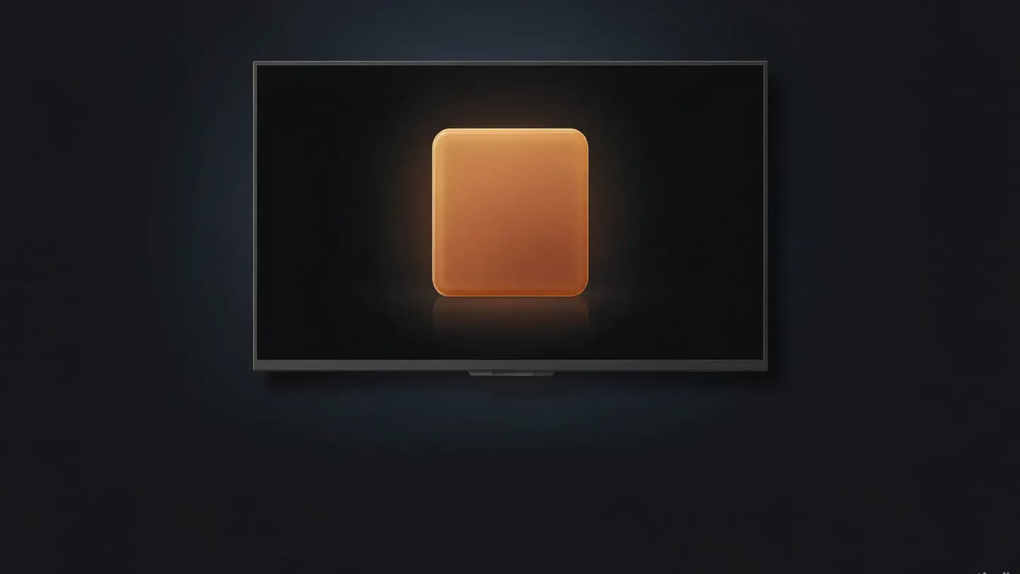A wall-mounted television in a dark living room filled with one bold amber product tile before any content starts