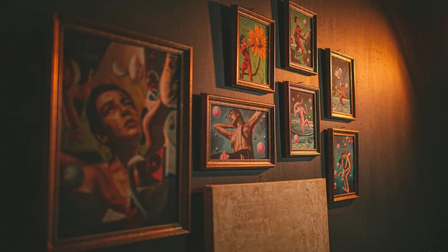 Storyboard frames on a studio wall showing escalating surreal shapes